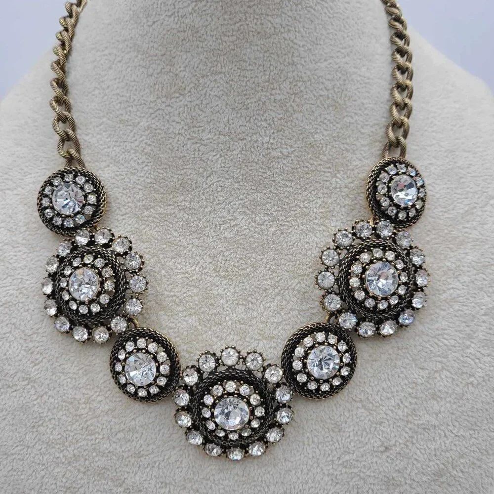 Vintage J Crew Pinwheel Starburst Antique Brass Crystal Necklace